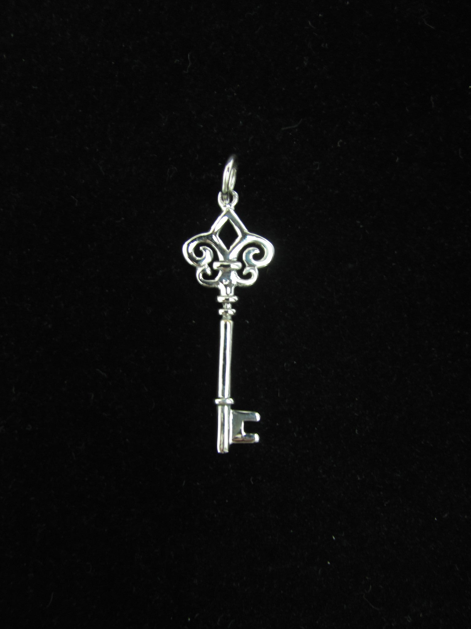 Fleur de clearance lis key pendant